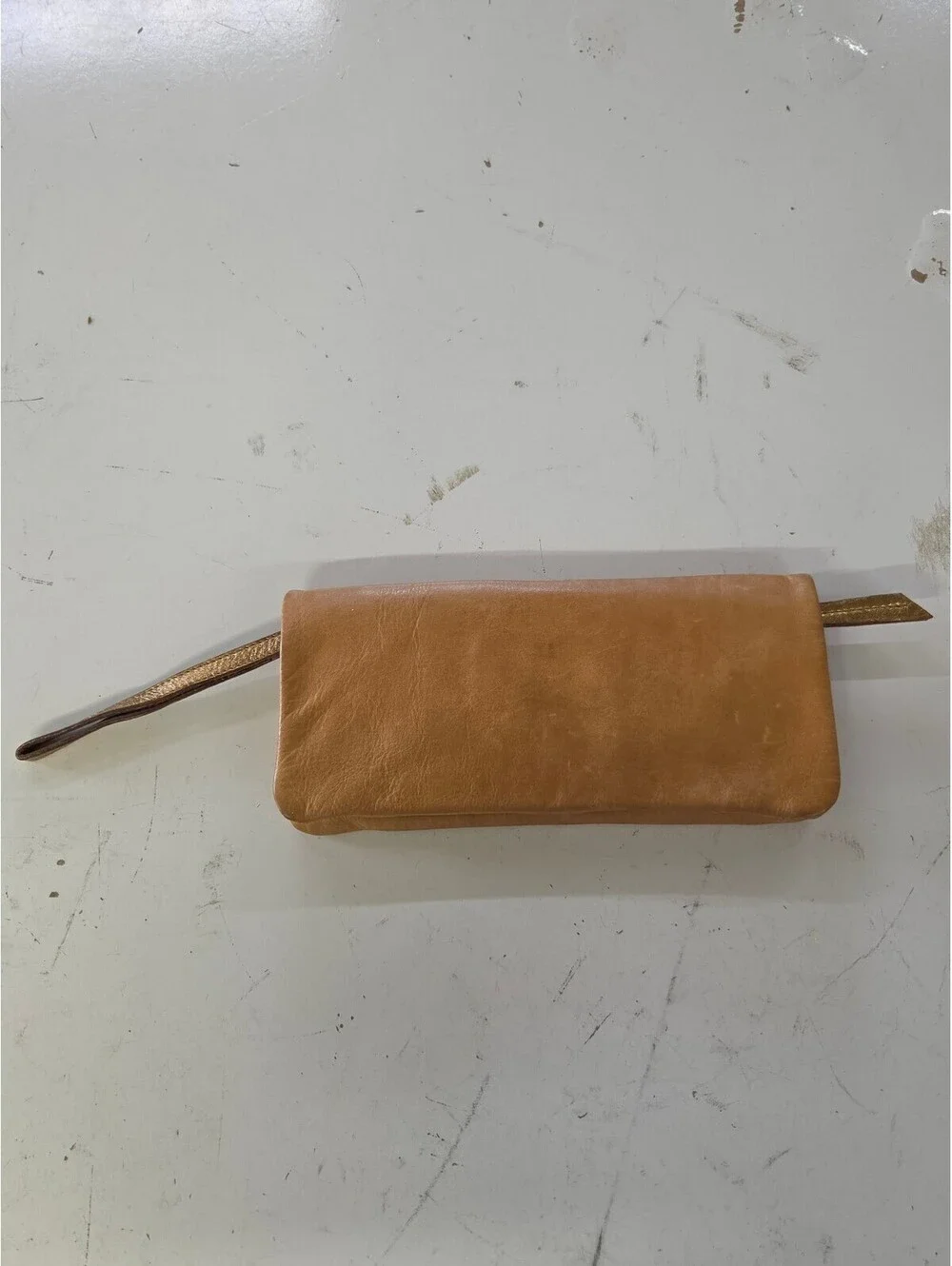 Samvara Leather Wristlet Clutch with Gold Embroidered Detail